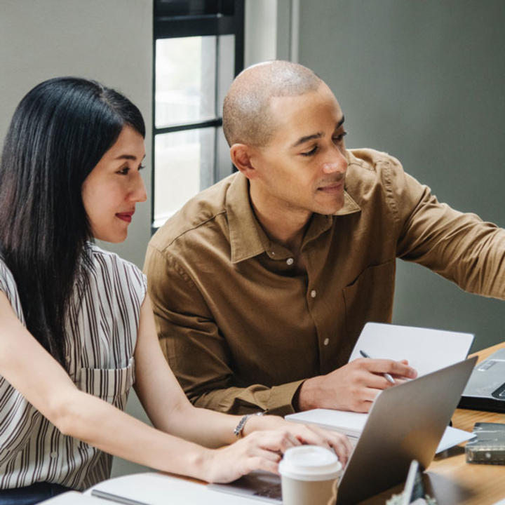 Image of workers with computers